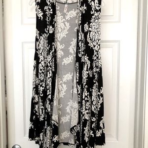 Sleeveless cardigan front shark tail…worn once